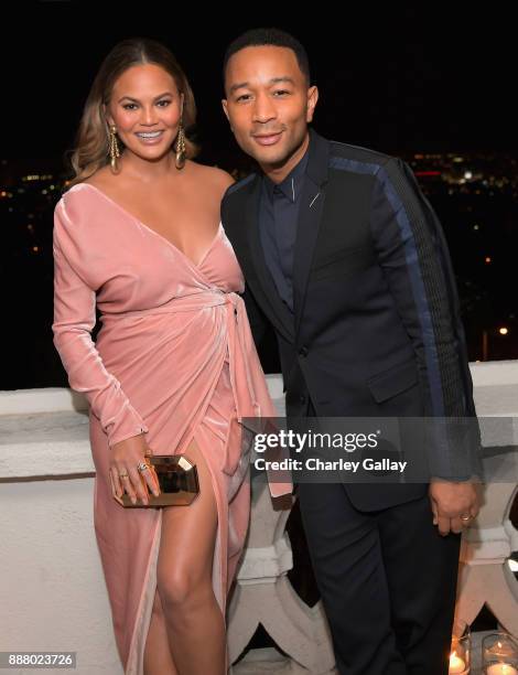 Chrissy Teigen and John Legend attend GQ and Dior Homme private dinner in celebration of The 2017 GQ Men Of The Year Party at Chateau Marmont on...