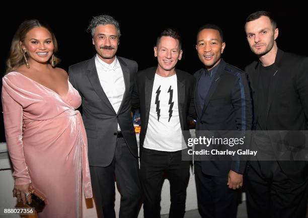 Chrissy Teigen, Taika Waititi, GQ Magazine Editor-in-Chief Jim Nelson, John Legend and Kris Van Assche attend GQ and Dior Homme private dinner in...