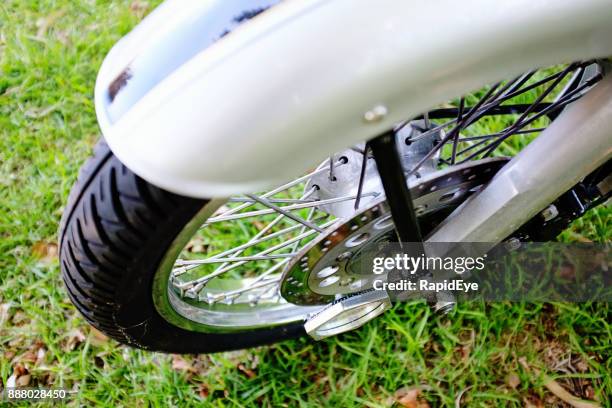 front wheel of royal enfield classic 500 motorcycle - indian royal enfield stock pictures, royalty-free photos & images