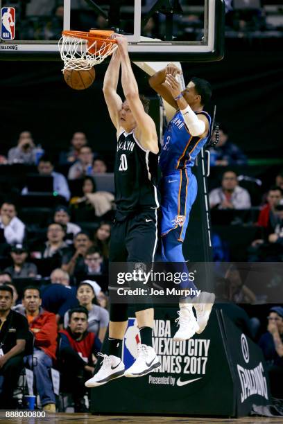 Timofey Mozgov of the Brooklyn Nets dunks the ball against the Oklahoma City Thunder as part of the NBA Mexico Games 2017 on December 7, 2017 at the...