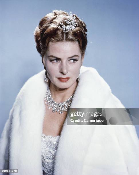 Portrait of the actress Ingrid Bergman, wearing a fur coat, and diamond necklace and tiara, ca.1960s.