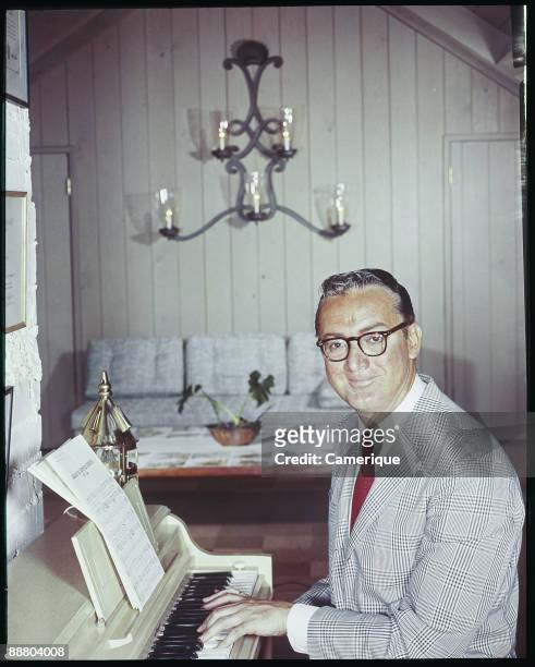Portrait of the comedian and television host Steve Allen playing the piano, ca.1960s.