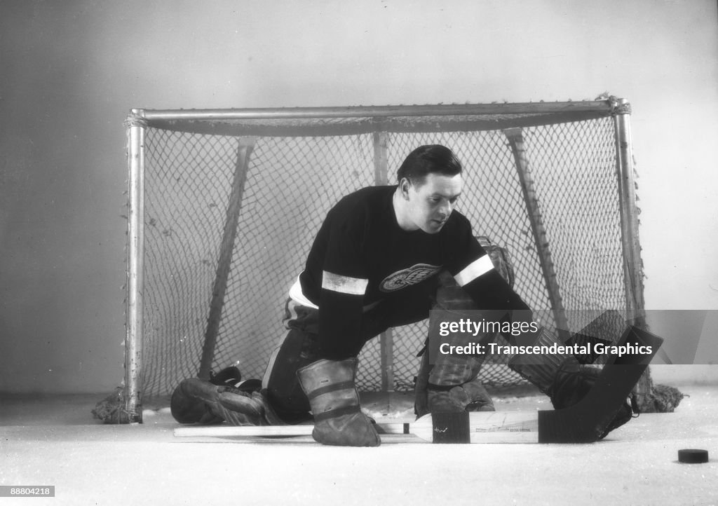 Tiny Thompson Posing In Goal