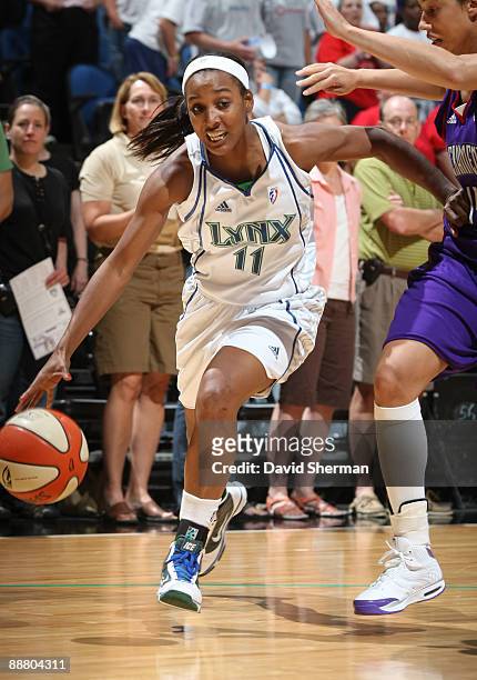 Candice Wiggins of the Minnesota Lynx drives to the basket against Nicole Powell of the Sacramento Monarchs during the game on July 2, 2009 at the...