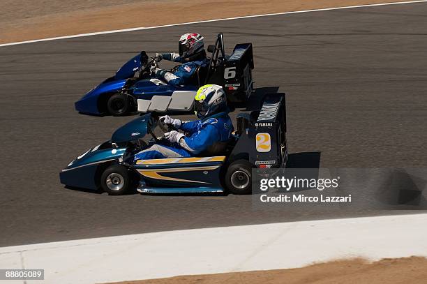 Kenny Roberts Jr. And Wayne Rainey drive karts during the the pre-event for MotoGP World Championship U.S. GP at Mazda Raceway Laguna Seca on July 2,...