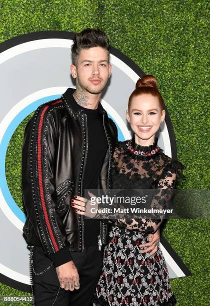 Travis Mills and Madelaine Petsch attend the 2017 GQ Men of the Year party at Chateau Marmont on December 7, 2017 in Los Angeles, California.