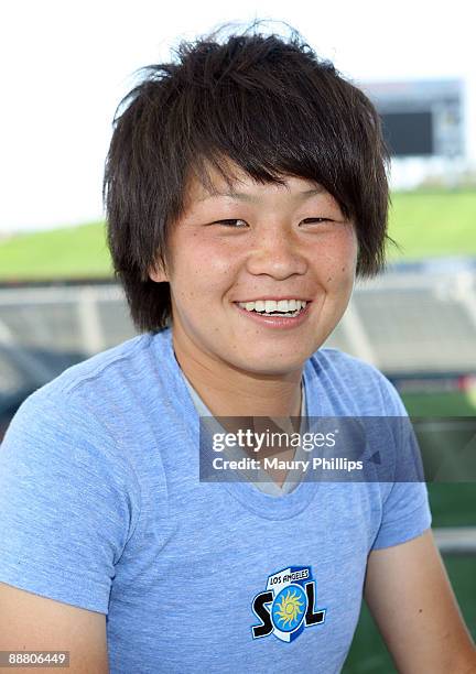 Los Angeles Sol player Aya Miyama poses during Steffi Jones' visit to the Los Angeles Sol players on July 2, 2009 in Los Angeles, California.