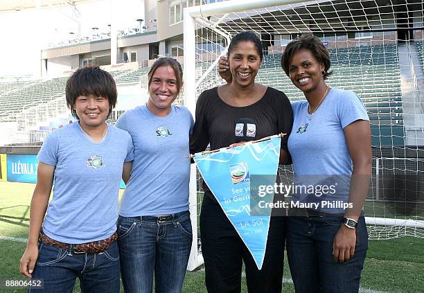 Los Angeles Sol players Aya Miyama, Camille Abily and Karina Le Blanc pose with president of the FIFA Women's World Cup Organizing Committee Steffi...