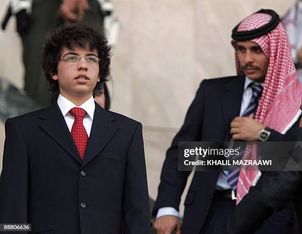 Jordanian Prince Hussein , eldest son of King Abdullah II, and the King's half-brother Prince Hamza , attend a ceremony in Amman on June 9, 2009...