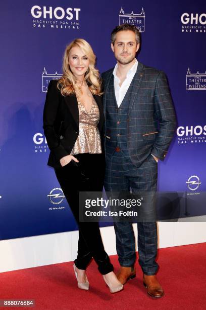 German actress Caroline Beil and her partner Philipp Sattler during the premiere of 'Ghost - Das Musical' at Stage Theater on December 7, 2017 in...