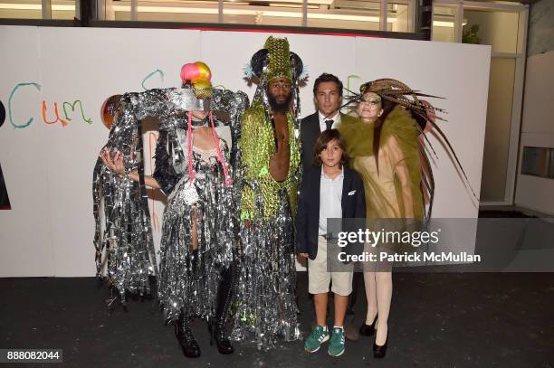 Fabian Basabe and Susanne Bartsch pose with performers during the Unveiling of White Square by Richard Meier & Partners at Citigroup Center on...