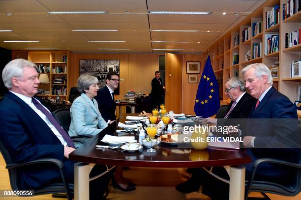 Britain's Secretary of State for Exiting the European Union David Davis , Britain's Prime Minister Theresa May , European Commission President...