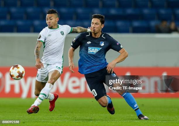 Robert Zulj of Hoffenheim and Anicet Abel of Ludogorets battle for the ball during the UEFA Europa League group C match between 1899 Hoffenheim and...