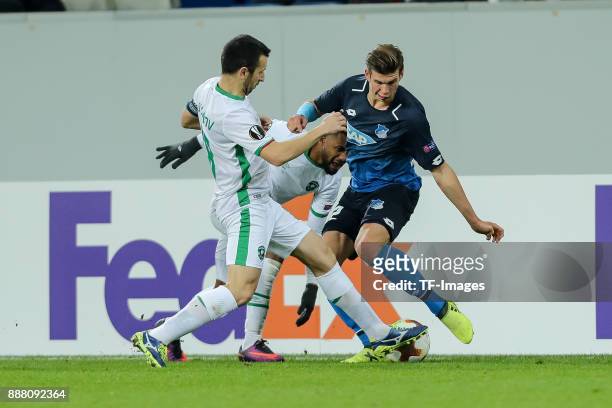 Svetoslav Dyakov of Ludogorets Cicinho of Ludogorets and Alexander Rossipal of Hoffenheim battle for the ball during the UEFA Europa League group C...