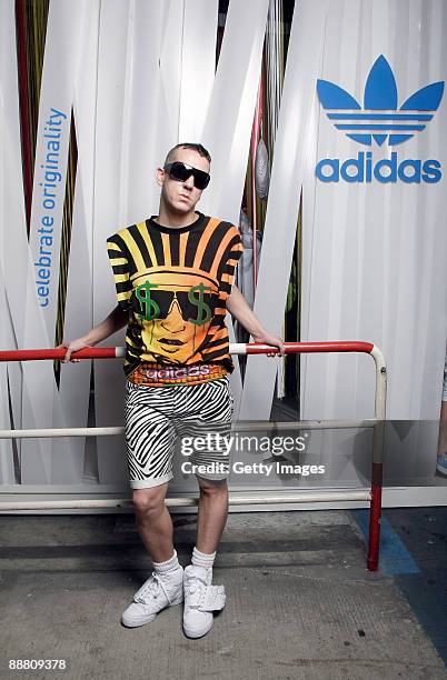 Designer Jeremy Scott visits the stand of 'adidas Originals' at the Bread and Butter fashion trade fair at former Tempelhof Airport on July 3, 2009...