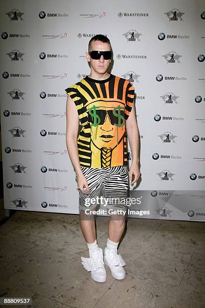 Designer Jeremy Scott visits the stand of 'adidas Originals' at the Bread and Butter fashion trade fair at former Tempelhof Airport on July 3, 2009...