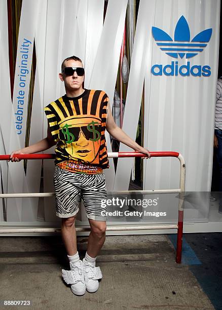 Designer Jeremy Scott visits the stand of 'adidas Originals' at the Bread and Butter fashion trade fair at former Tempelhof Airport on July 3, 2009...