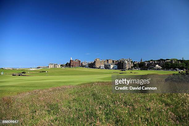 View of the 1st green with the Royal and Ancient Golf Club of St Andrews Clubhouse with the 1st fairway and the par 4, 18th hole on the Old Course on...