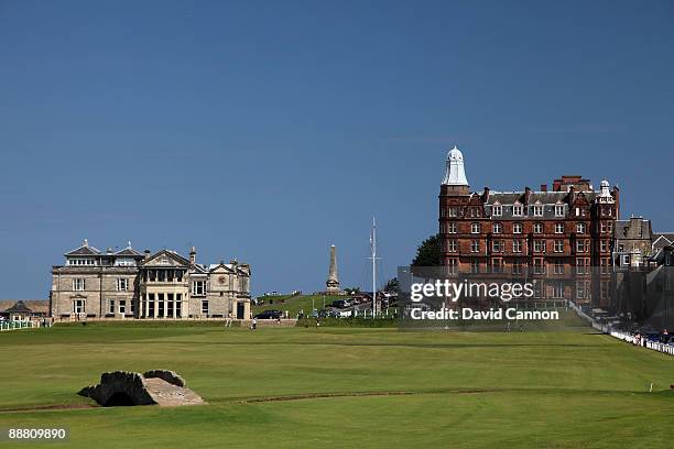 View of the par 4 18th hole with the Royal and Ancient Golf Club of St Andrews Clubhouse and the Swilcan Bridge on the Old Course on July 2, 2009 in...