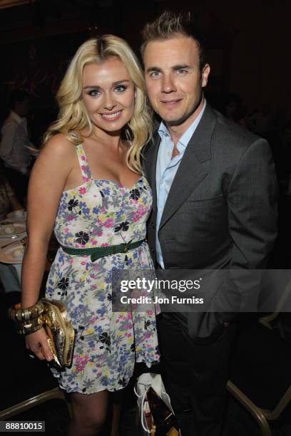 Singers Katherine Jenkins and Gary Barlo from Take That attend the O2 Silver Clef Awards 2009 at the London Hilton on July 3, 2009 in London, England.