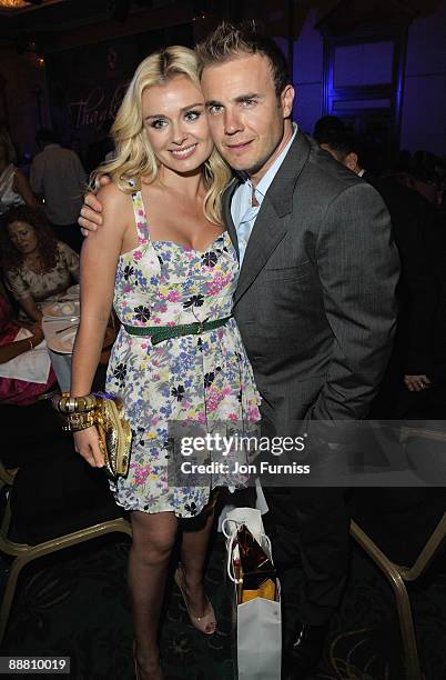 Singers Katherine Jenkins and Gary Barlo from Take That attend the O2 Silver Clef Awards 2009 at the London Hilton on July 3, 2009 in London, England.