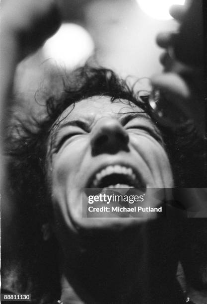 Singer Brian Johnson performing with heavy rock group AC/DC on tour in the UK, 1980. Johnson joined the band earlier in the year, after the death of...