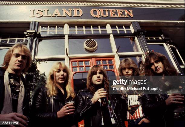 English heavy metal group Iron Maiden outside the Island Queen pub in Islington, London, 1982. Left to right: guitarist Adrian Smith, guitarist Dave...