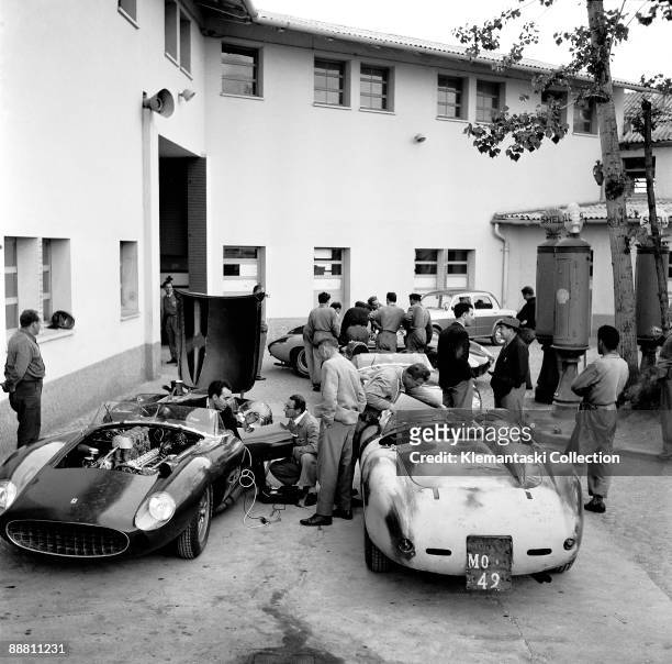 Before The Mille Miglia; Maranello, May 1957. The team cars being prepared in the factory courtyard at Maranello with the Collins/Klemantaski car at...