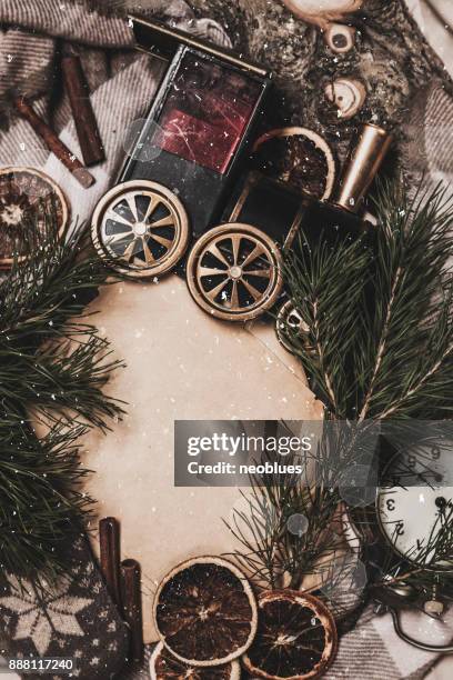 top view of cozy christmas and winter setting - orange alarm clock stock pictures, royalty-free photos & images