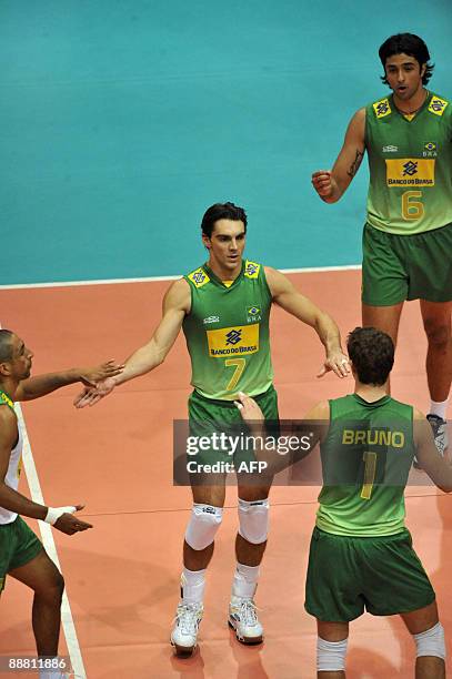 Brazil's Sergio Dutra Santos , Giba , Bruno Rezende and Leandro Vissotto Neves celebrate during the FIVB World League volleyball match between...