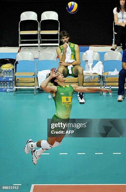 Brazil's Giba jumps to serve during the FIVB World League volleyball match between Finland and Brazil in Tampere on July 3, 2009. AFP PHOTO/LEHTIKUVA...