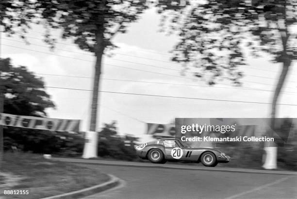 The 24 Hours of Le Mans; Le Mans, June 15-16, 1963. The Ferrari 250GTO of Carlo Abate and Fernand Tavano at speed on Mulsanne. They did not finish.