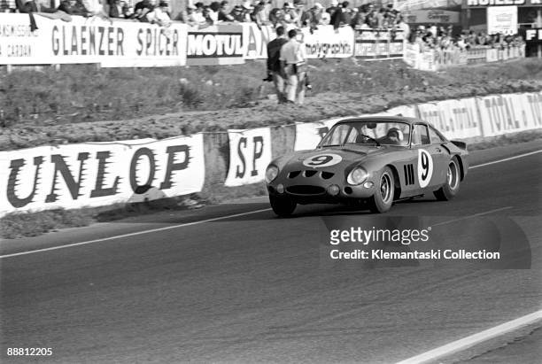 The 24 Hours of Le Mans; Le Mans, June 15-16, 1963. The Ferrari 330LMB driven by Jean Guichet and Pierre Noblet sweeps through the Dunlop Curve. They...