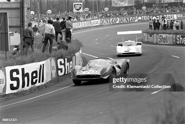 The 24 Hours of Le Mans; Le Mans, June 10-11, 1967. The Ferrari P4 driven by Chris Amon and Nino Vaccarella in the Esses ahead of the...