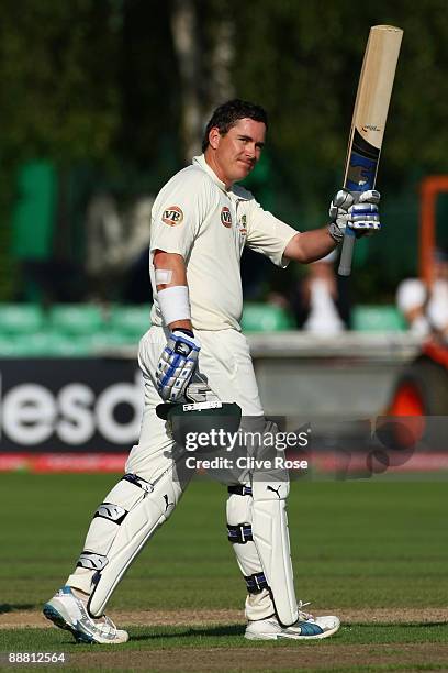 Marcus North of Australia celebrates his century during the Ashes warm-up match between England Lions and Australia at New Road on July 3, 2009 in...