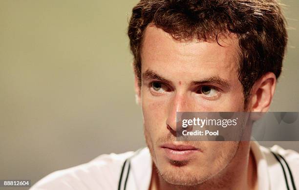 Andy Murray of Great Britain attends a press conference after defeat during the men's singles semi final match against Andy Roddick of USA on Day...