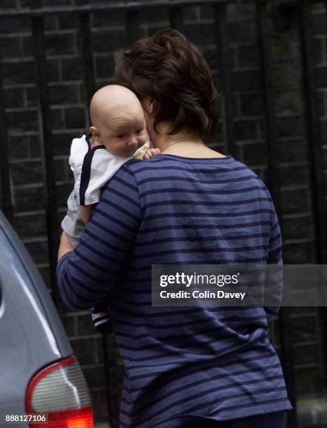 British barrister and lecturer Cherie Blair arrives at 10 Downing Street with 2 month old baby Leo, London, UK, 18th July 2000.