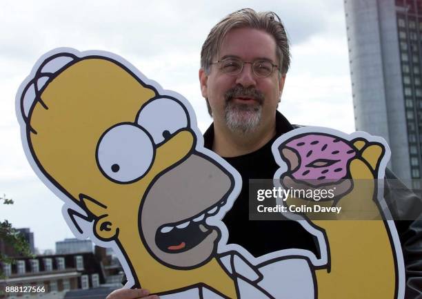 Matt Groening, creator of The Simpsons with cut out of Homer Simpson, London, 16th August 2000.