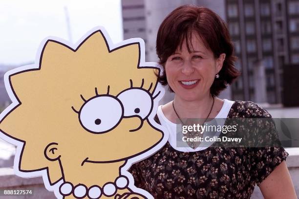 The voices behind The Simpsons, Yeardley Smith with cutout of Lisa Simpson, London, 16th August 2000.