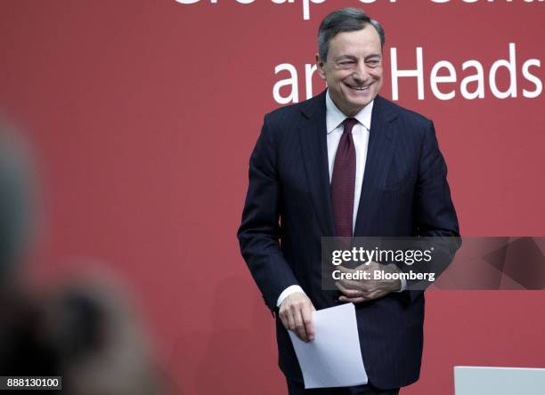 Mario Draghi, president of the European Central Bank , departs a Basel III capital rules news conference at the ECB headquarters in Frankfurt,...