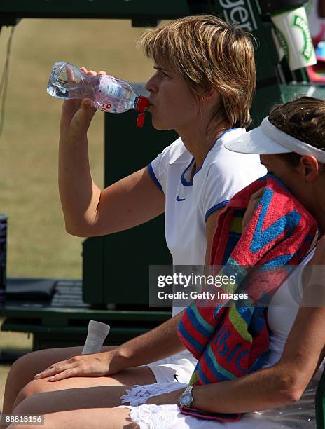 Annabel Croft of Great Britain and Samantha Smith of Great Britain take a break during the women's doubles invitation match against Ilana Kloss of...