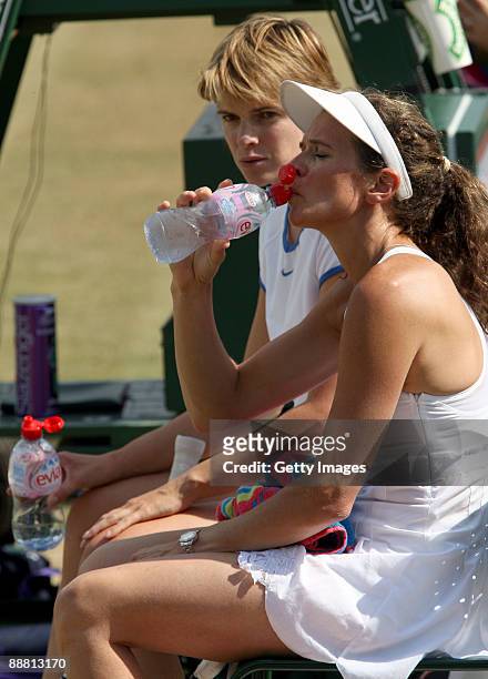 Annabel Croft of Great Britain and Samantha Smith of Great Britain take a break during the women's doubles invitation match against Ilana Kloss of...