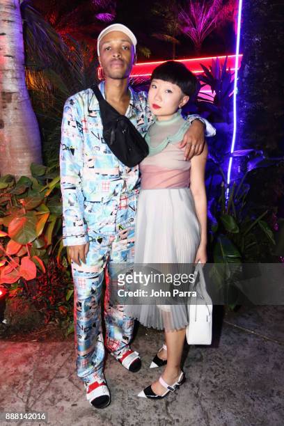 Antwaun Sargent and JiaJia Fei attend Prada Double Club Miami, A Carsten Holler Project at Ice Palace Film Studios on December 7, 2017 in Miami,...