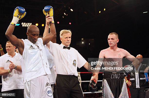 The referee declares French Souleymane Mbaye winner of his light-welterweight European champion boxing fight against British Colin Lynes , on July 3,...