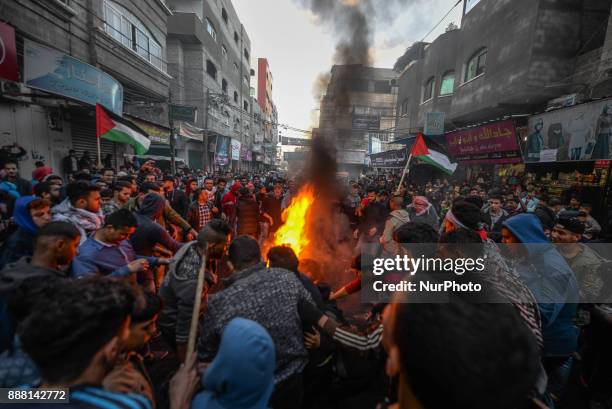 Palestinians refugees attend a protest against the US President decision to recognize Jerusalem as the capital of Israel, in Jabaliya refugee camp,...
