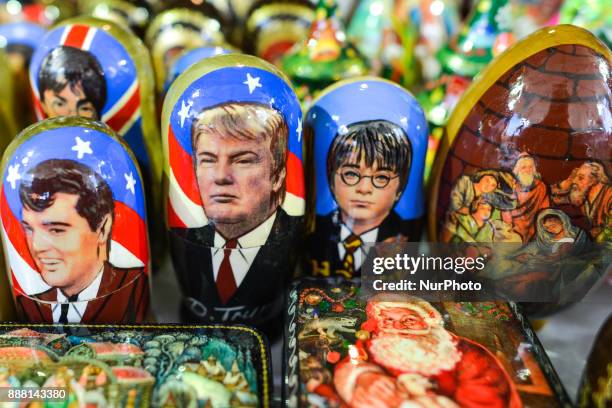 View of a stand selling 'matryoshka' dolls with images of Donald Trump, Elvis Presley and Harry Potter personages, at Christmas Market in Krakow's...