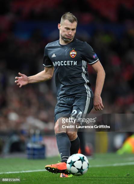 Vasili Berezutski of CSKA Moskva passes the ball during the UEFA Champions League group A match between Manchester United and CSKA Moskva at Old...