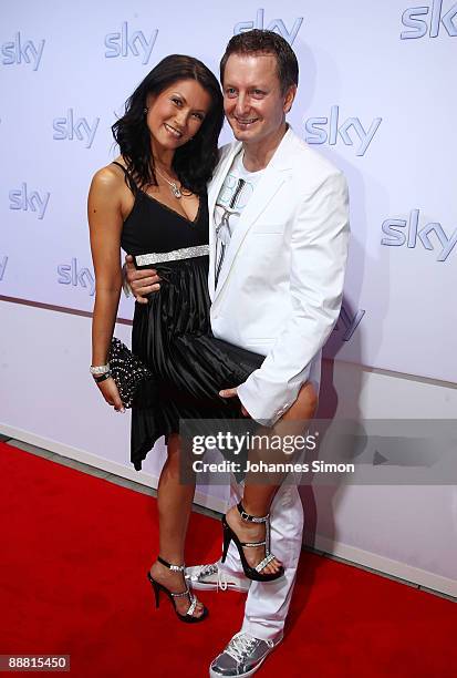 Austrian singer Antonia aus Tirol and her partner Peter Schutti arrive for the Sky pay TV channel launch at Schrannenhalle on July 3, 2009 in Munich,...