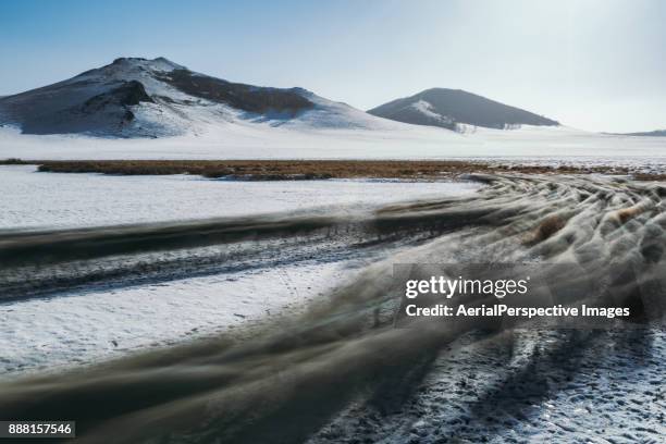 flock of sheep in deep snow (long exposure) - long distance relationship stockfoto's en -beelden