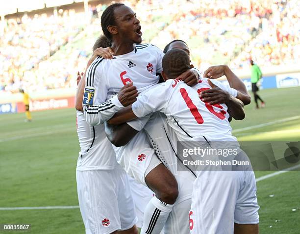 Julian De Guzman of Canada celebrates the game winning goal by teammate Ali Ngon Gerba in the second half against Jamaica during the 2009 CONCACAF...